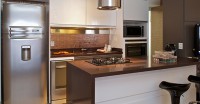 Como fazer uma bancada com cooktop entre a cozinha e a sala?
